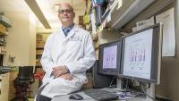 Dr. Ran Reshef sits in his lab